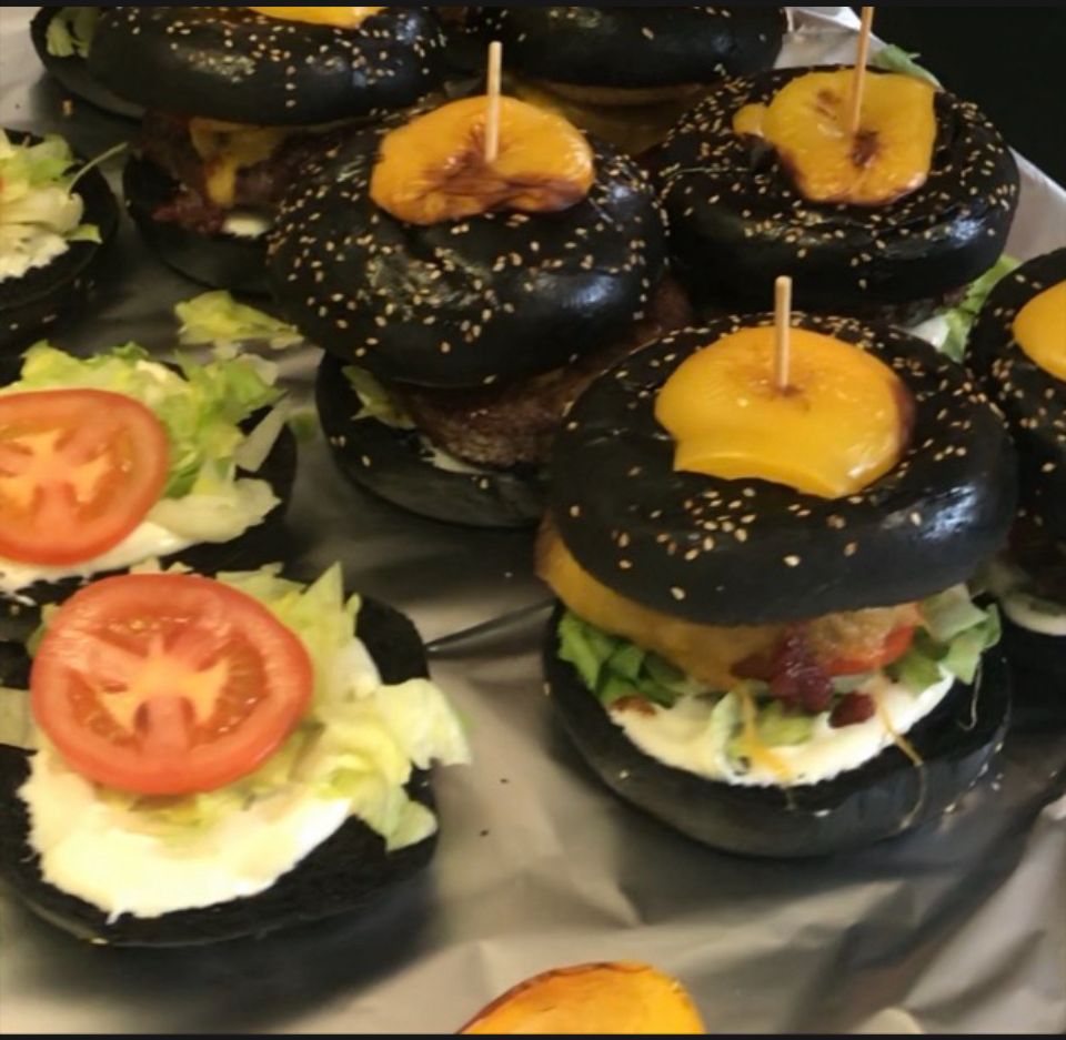 7onz Clonmore meats steak burger in an ink squid brioche bun